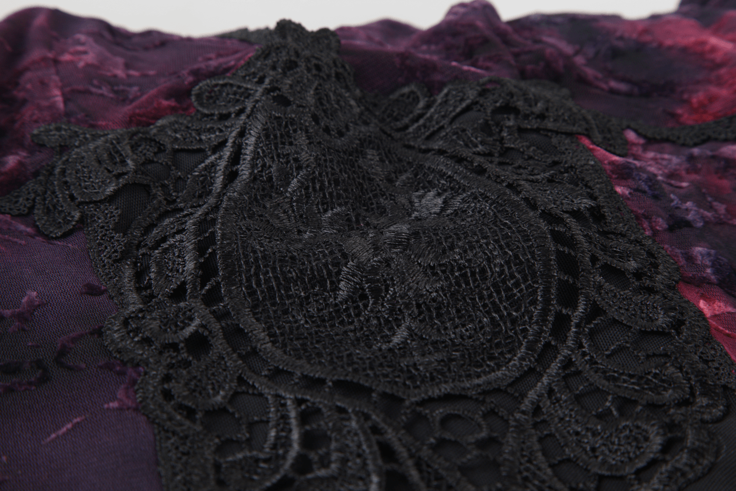 Alt Tag: Gothic Lace Bell Sleeved Maxi Dress and Sheer Mesh Inset close-up of black lace embroidery on purple floral mesh fabric