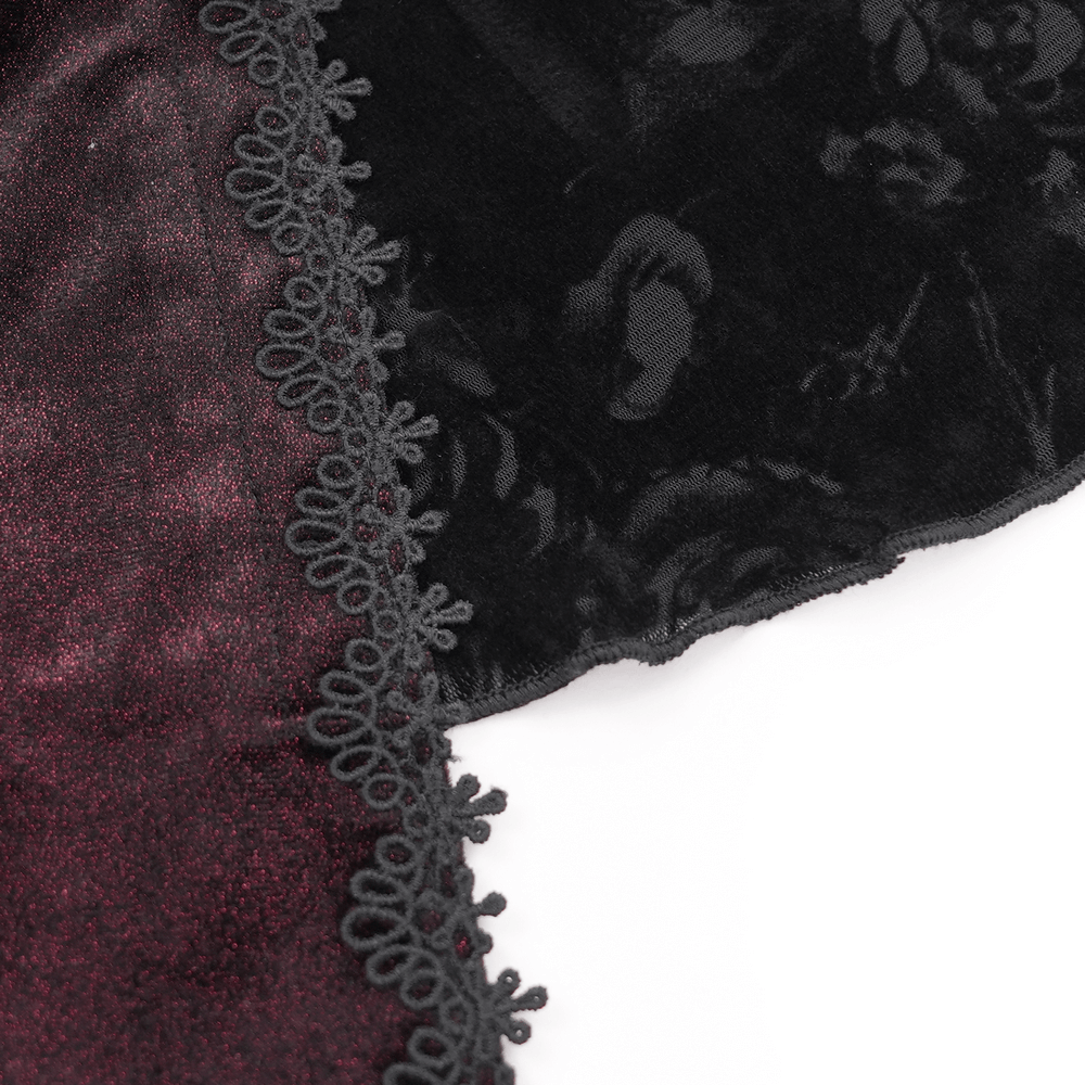 Close-up of gothic lace fabric in black and burgundy with intricate lace trim, perfect for alternative fashion.