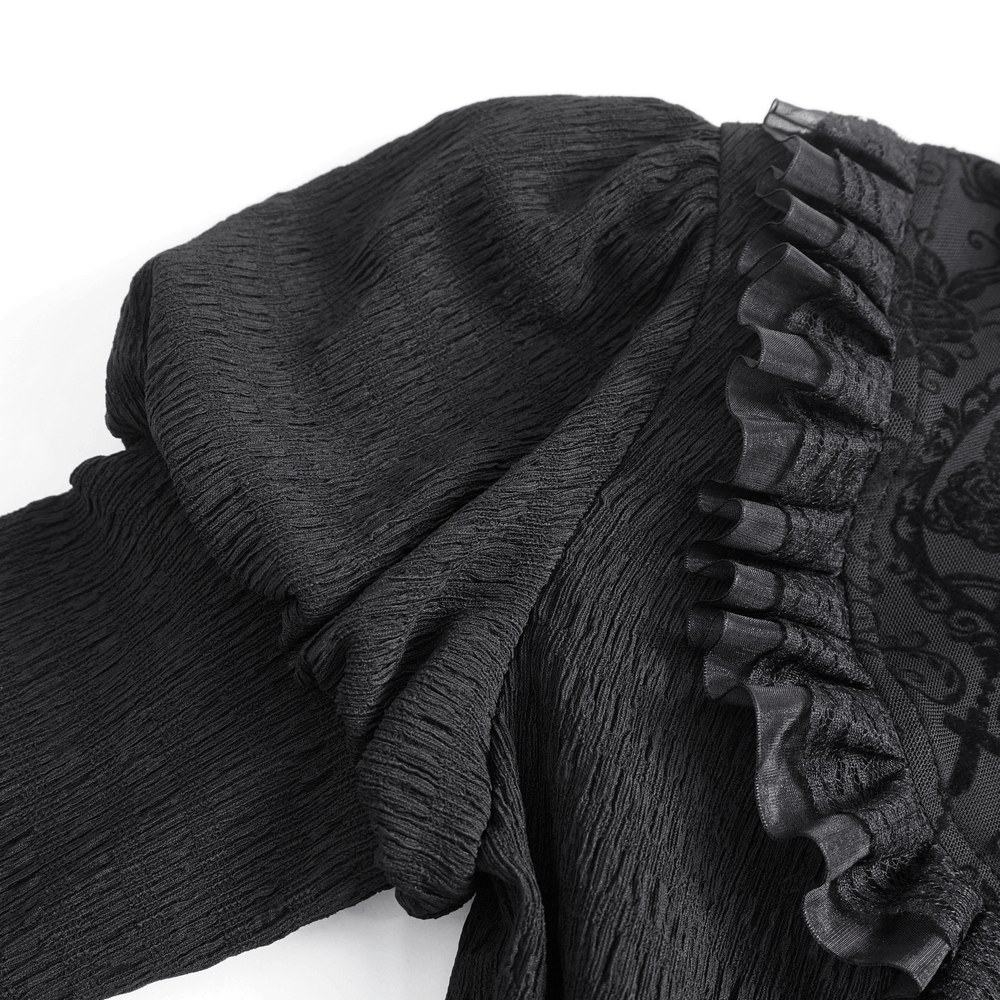 Victorian-inspired black lace blouse featuring ruffled neckline and flared sleeves, exuding gothic elegance.