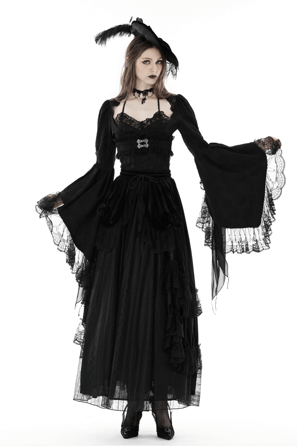 Gothic lace bolero with long bell sleeves, black jacquard crop top, showcasing evening elegance and dramatic flair.