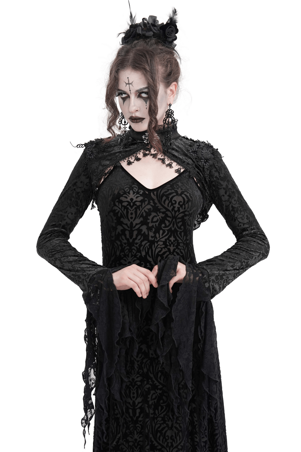 Gothic model wearing a black lace bolero with dramatic bell sleeves, showcasing a Victorian-inspired style.