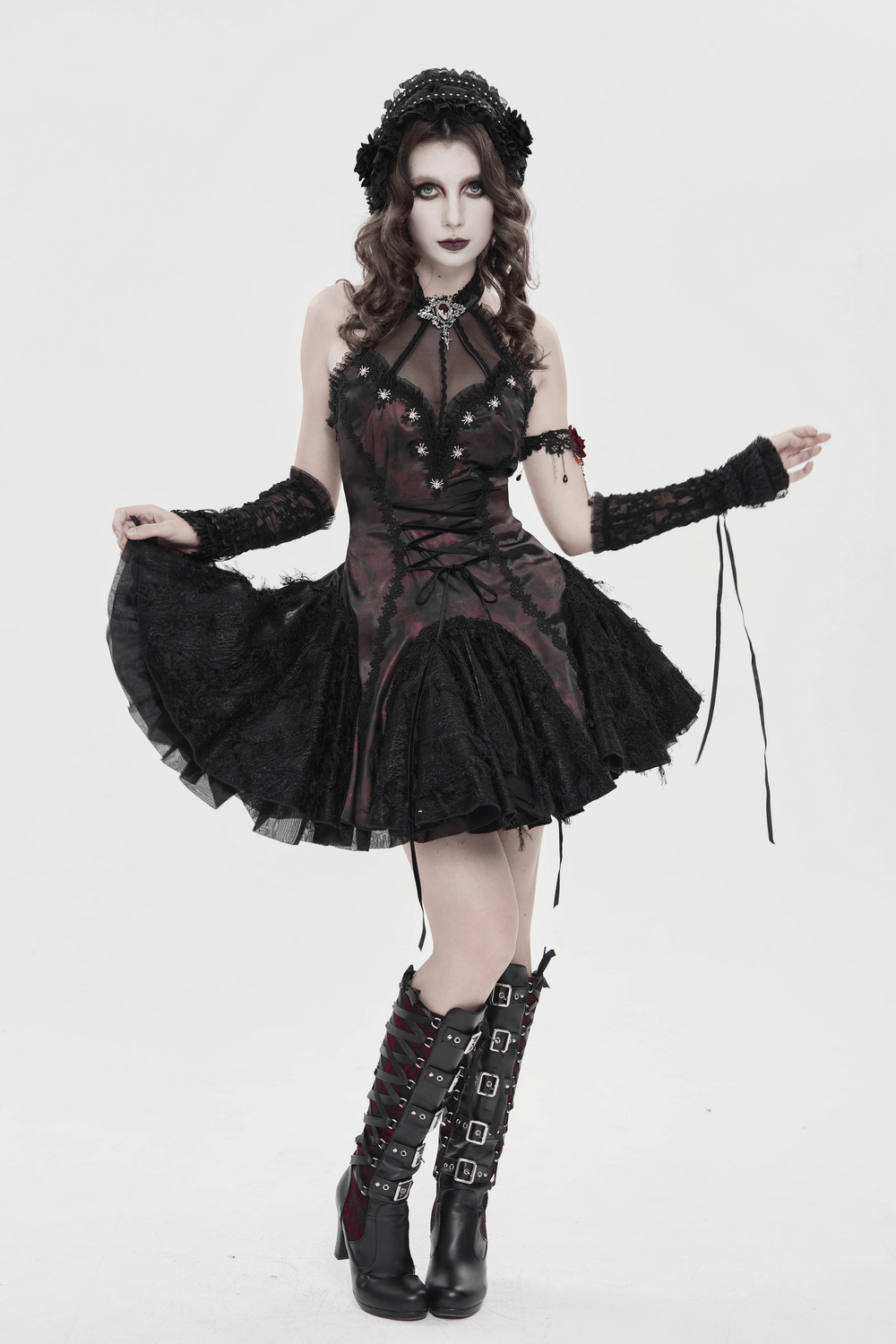 Gothic Lace Bonnet Headpiece with Rose Details elegantly showcased with a dark, layered dress and stylish accessories.