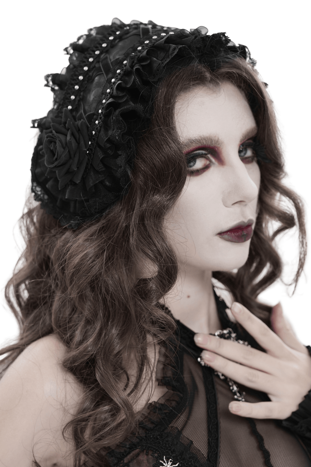 Gothic Lace Bonnet Headpiece with Rose Details worn by a model, featuring intricate lace and rose embellishments.