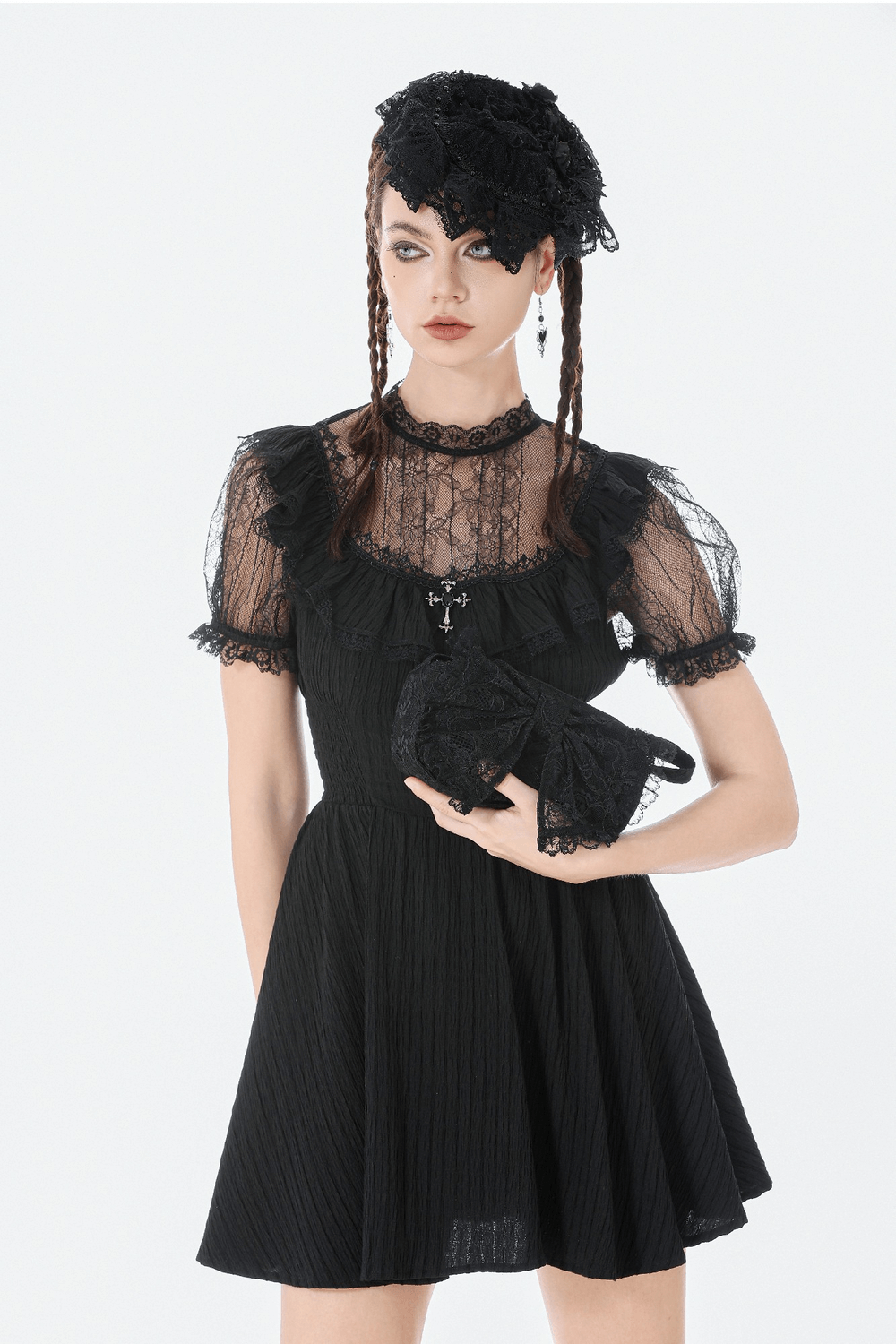 Gothic Lace Bow Mini Handbag with Zipper Closure styled with a black lace dress and accessories in a gothic look.