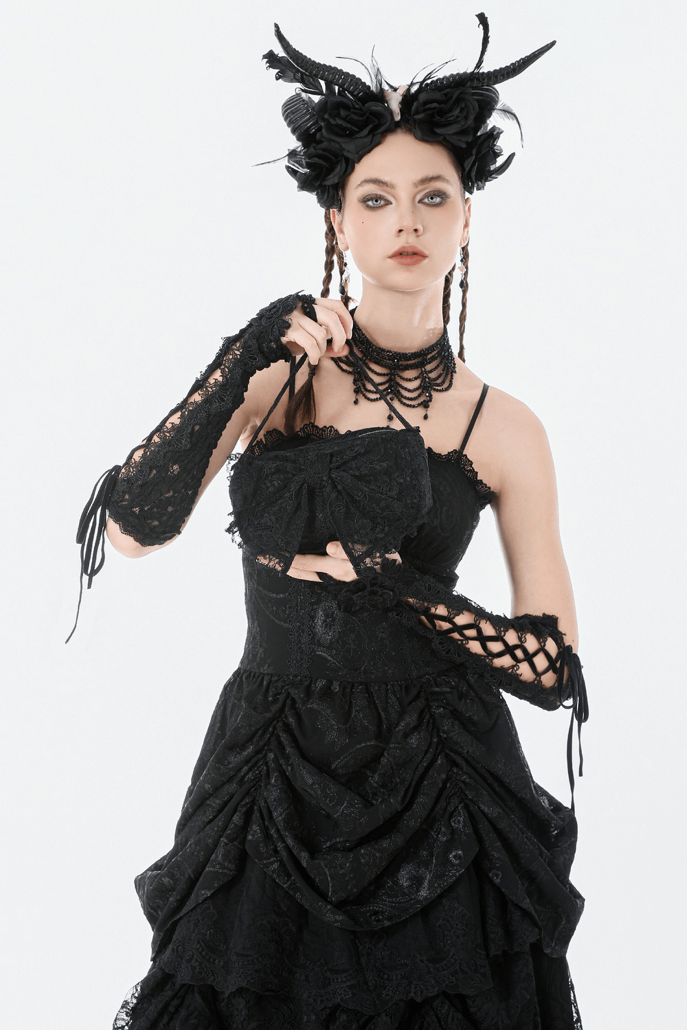 Gothic Lace Bow Mini Handbag with Zipper Closure styled with a black lace gown and dramatic accessories.
