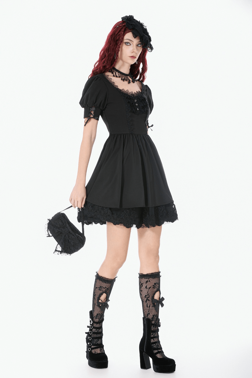 Gothic Lace Bow Mini Handbag with Zipper Closure complements a gothic outfit, paired with a black dress and lace stockings.