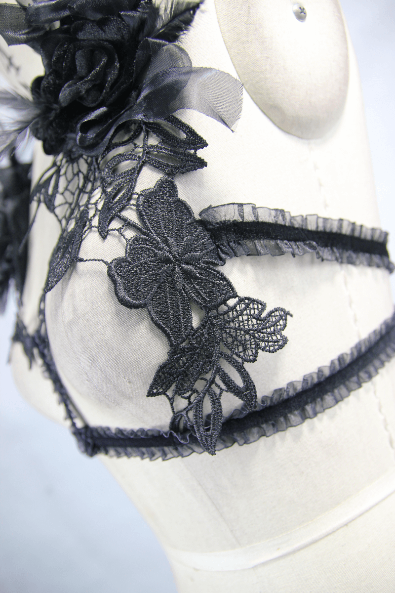 Gothic black lace chest harness top featuring floral accents and elastic straps for a stylishly edgy look.