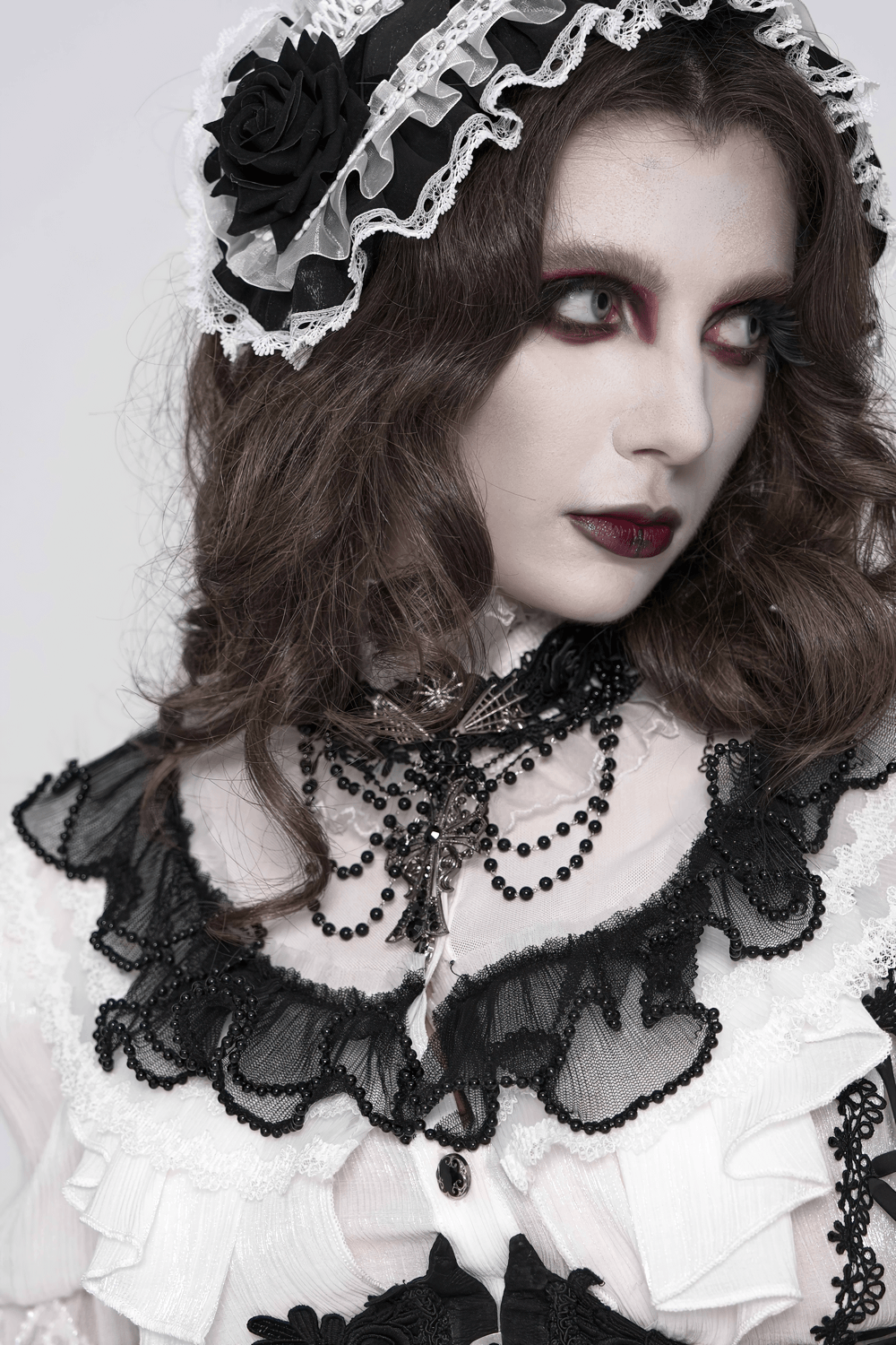 Gothic Lace Choker Necklace with Cross Pendant worn with Victorian-inspired goth outfit featuring lace and beads.