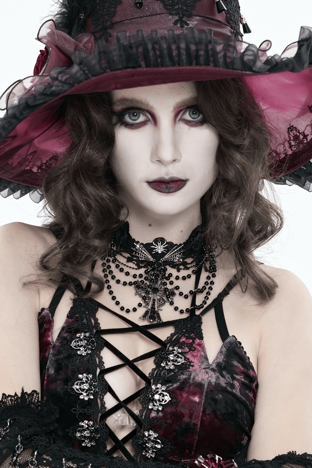 Gothic Lace Choker Necklace with Cross Pendant worn by model with gothic makeup and hat, showcasing Victorian elegance.