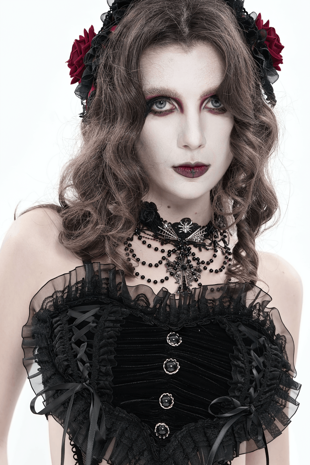 Gothic Lace Choker Necklace with Cross Pendant, styled with elaborate black corset and dark romantic makeup.