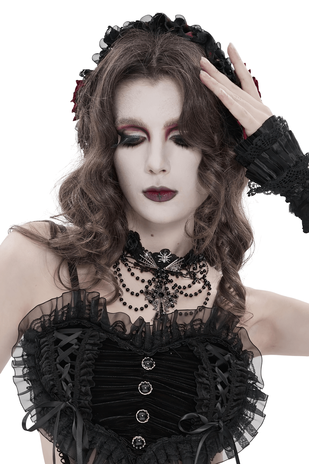 Gothic Lace Choker Necklace with Cross Pendant worn by a model in a dark romantic outfit showcasing Victorian style.