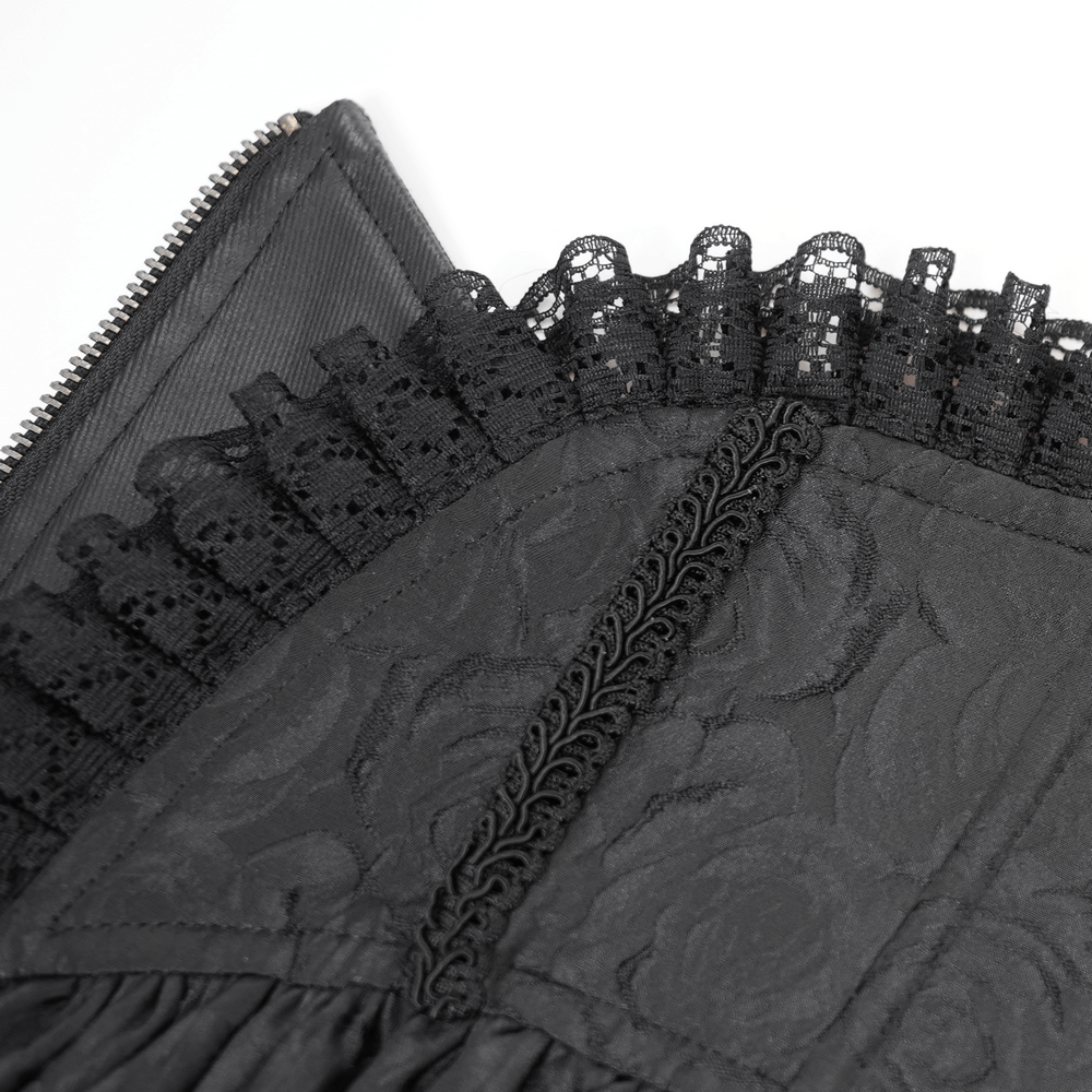 Close-up of Gothic lace corset belt with ruffled detailing and central zipper, showcasing intricate brocade fabric.