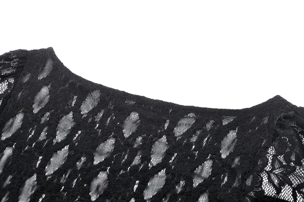 Close-up of black lace fabric on a gothic corset top with intricate design and elegant texture.