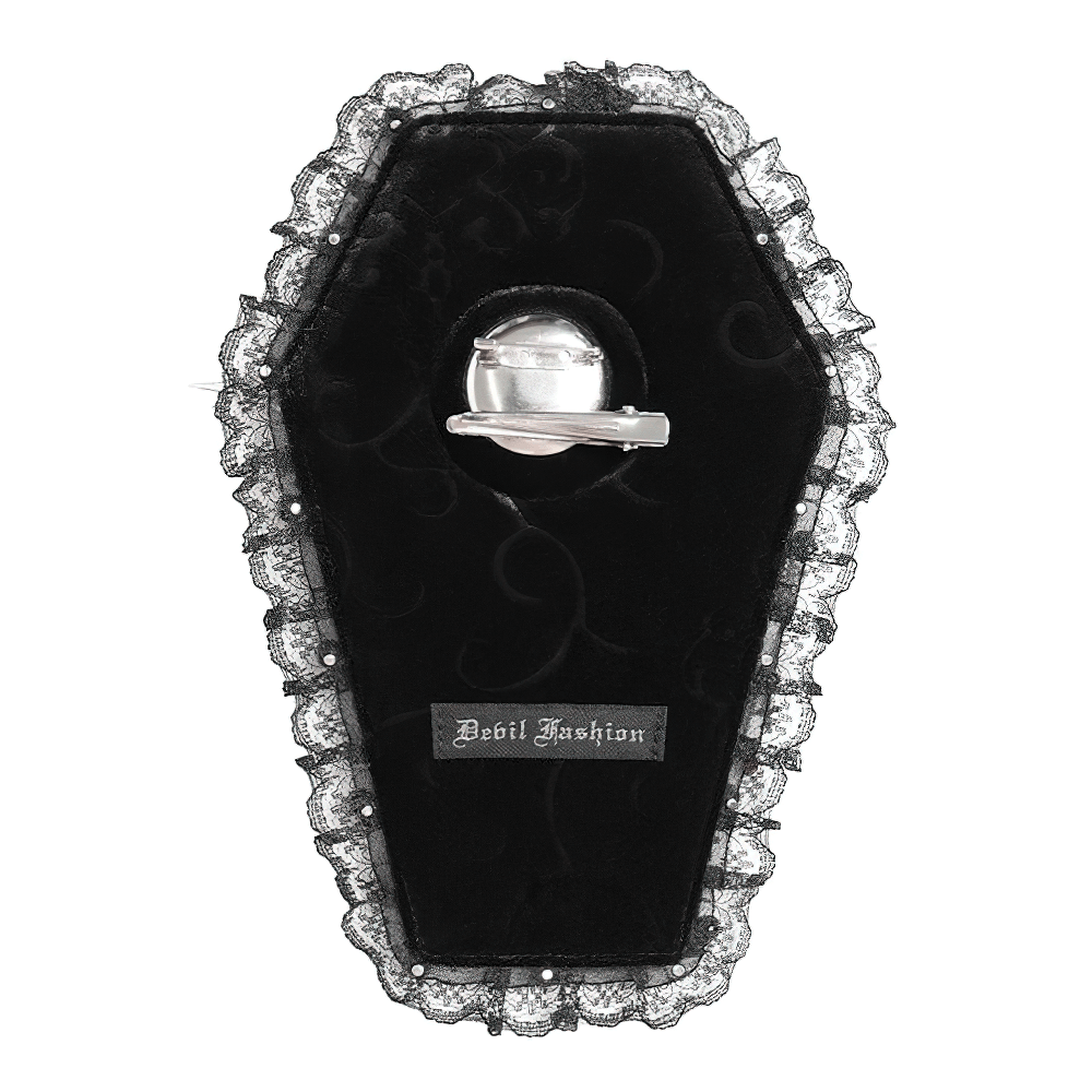 Gothic coffin-shaped brooch badge holder with lace trim and cross detail, perfect for alternative fashion.