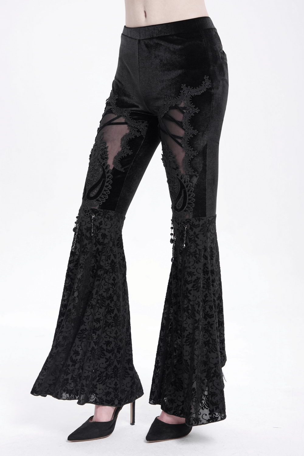 Gothic lace flare pants featuring velvet fabric, sheer lace panels, and intricate embroidery, perfect for edgy vintage vibes.