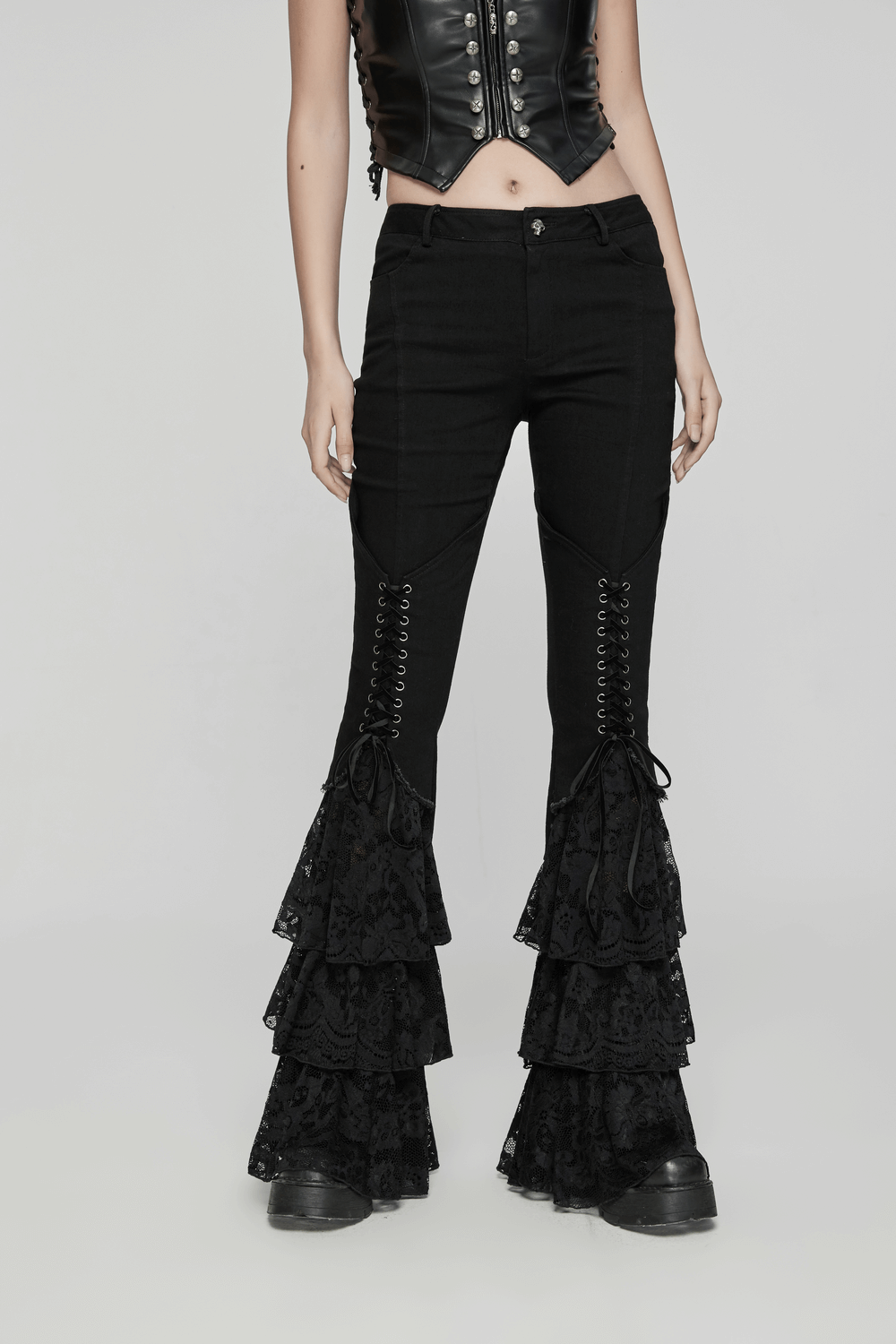 Gothic lace flared pants with V-shaped drawstring, exuding edgy punk rock style and dramatic flair.
