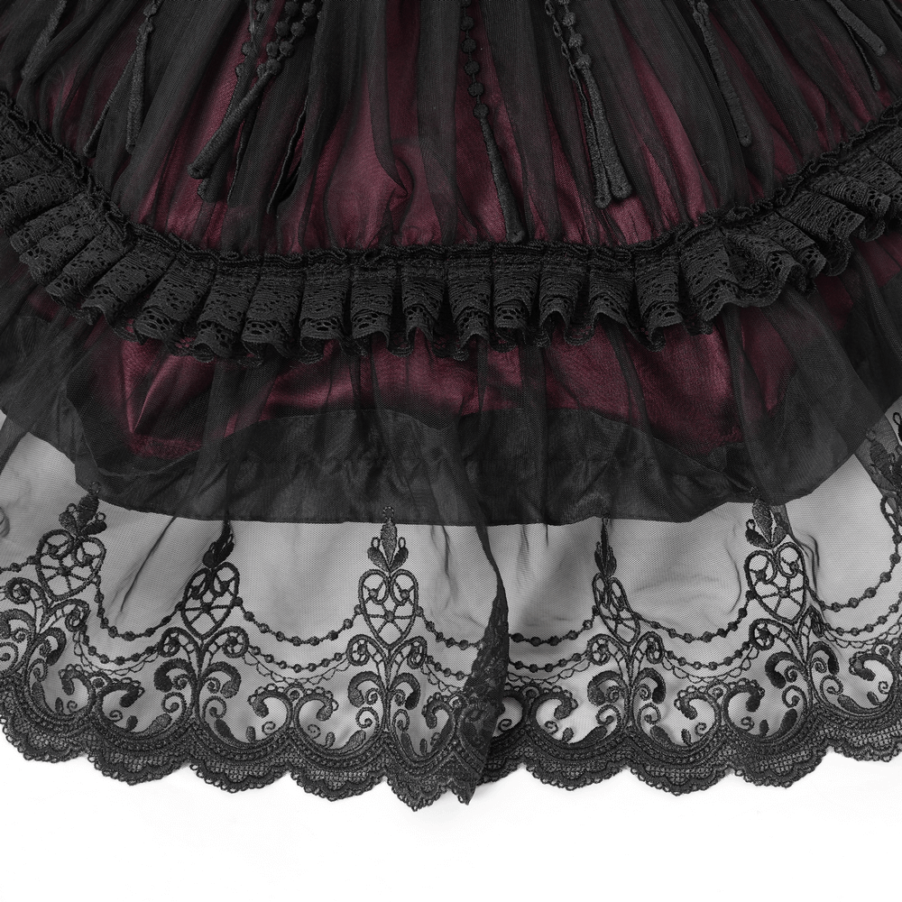 Elegant Gothic lace umbrella with black fringe and intricate lace trim, perfect for vintage-inspired fashion.