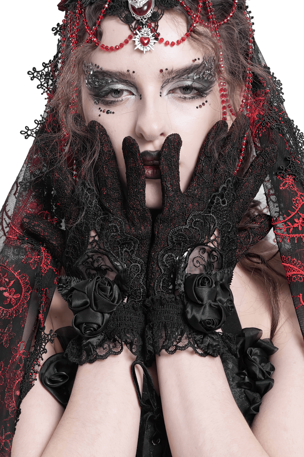 Elegant gothic lace gloves adorned with black roses and mesh details, perfect for a Victorian-style look.