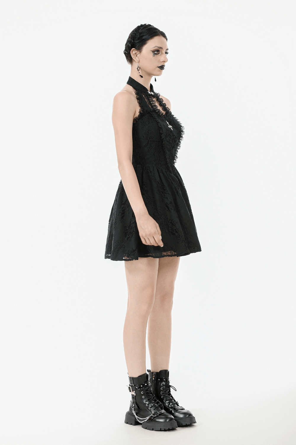 Gothic lace halter dress with keyhole neckline and flared A-line skirt, styled with combat boots for a dark romantic look.