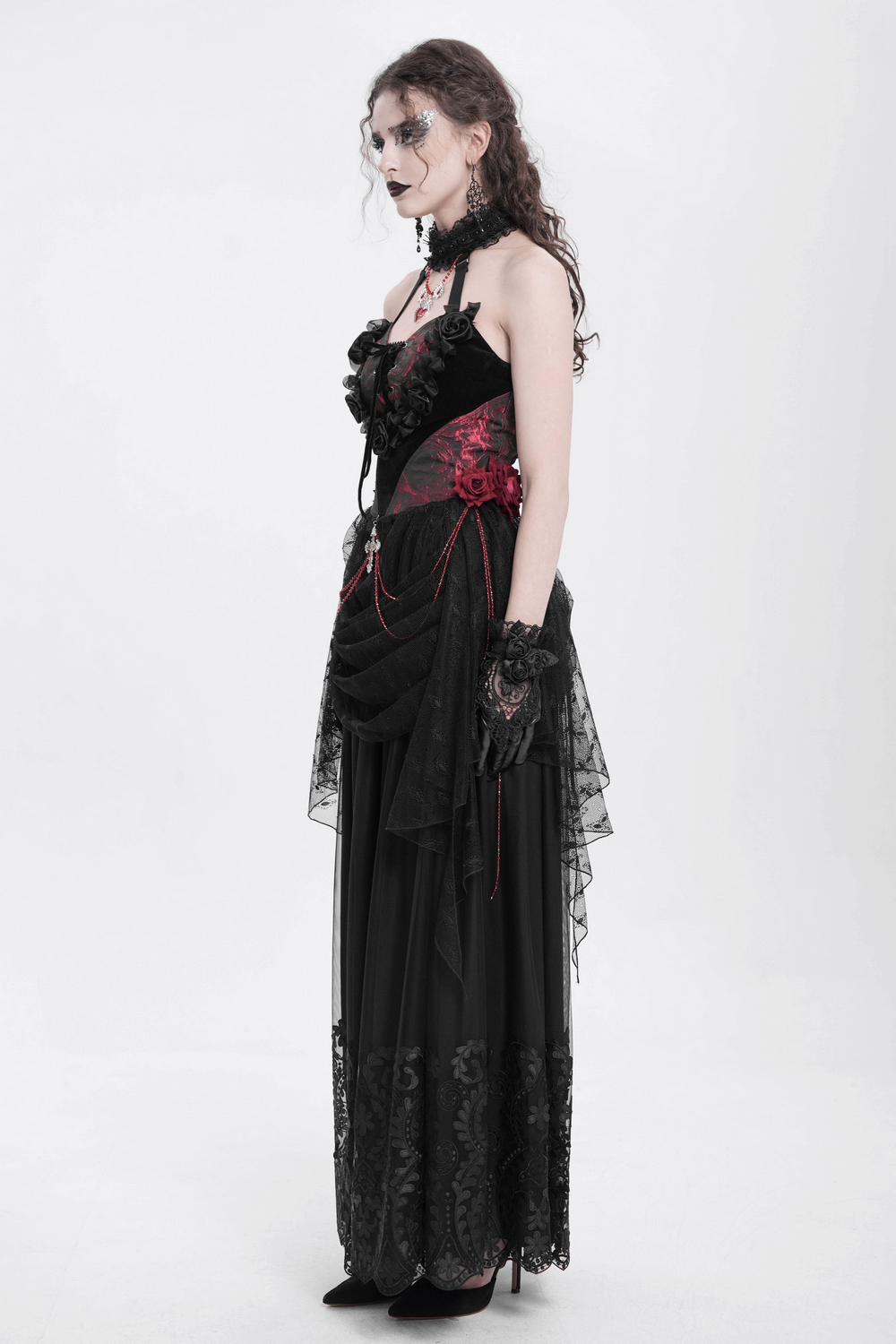 Elegant Gothic lace halter top with velvet roses and beaded chains, showcasing a stylish dark look.