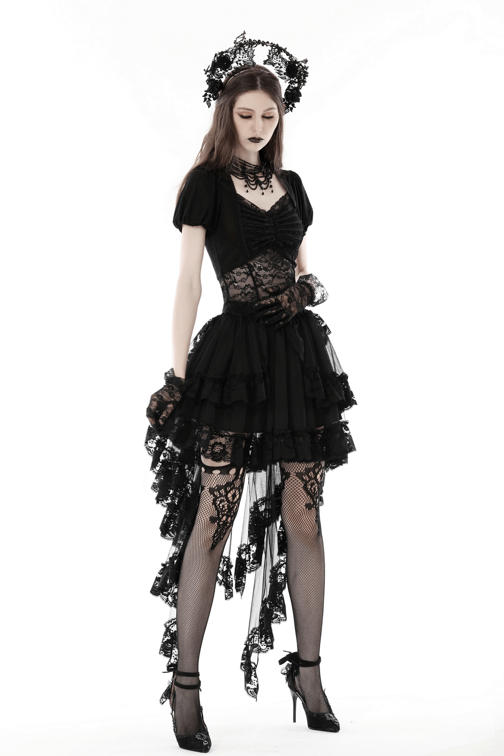 Gothic lace hi-low skirt with dramatic swallowtail hem, embodying dark elegance and captivating silhouette.