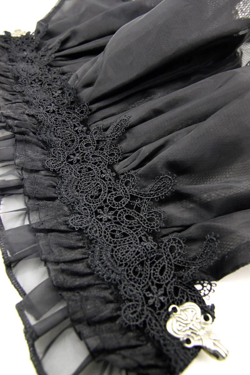 Black lace high collar with intricate design and vintage brooch, perfect gothic accessory for stylish outfits.