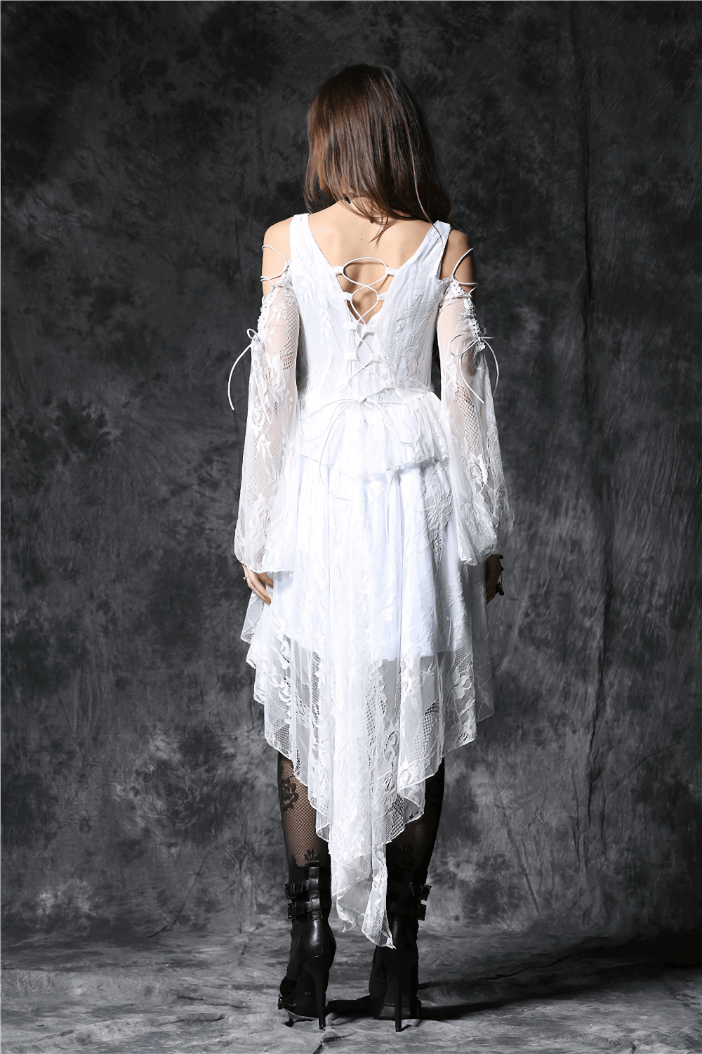 Back view of a Victorian-inspired Gothic lace high-low dress with sheer sleeves and elegant detailing.