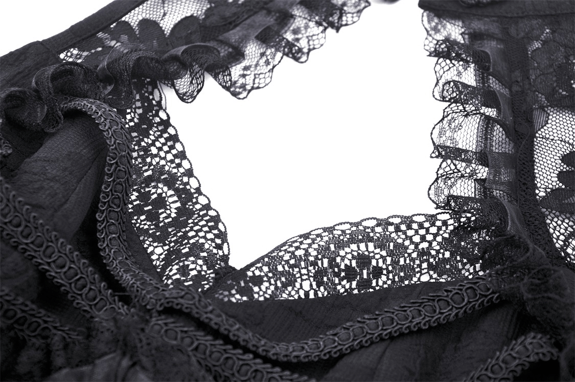 Close-up of intricate Gothic lace detailing on a halter dress, showcasing its vintage-inspired craftsmanship.