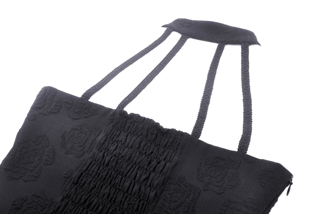 Stylish black lace handbag with intricate rose detailing and unique strap design.