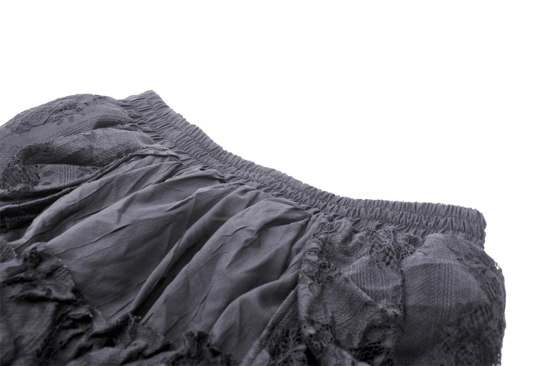Detailed view of the elastic waistband of the Gothic high-low lace skirt with ruffles for women.
