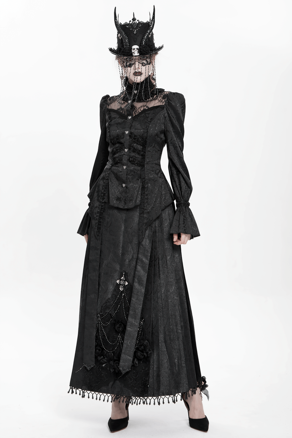 Gothic victorian-style dress with ruffled sleeves and dramatic hat, embodying dark elegance and intricate detailing.