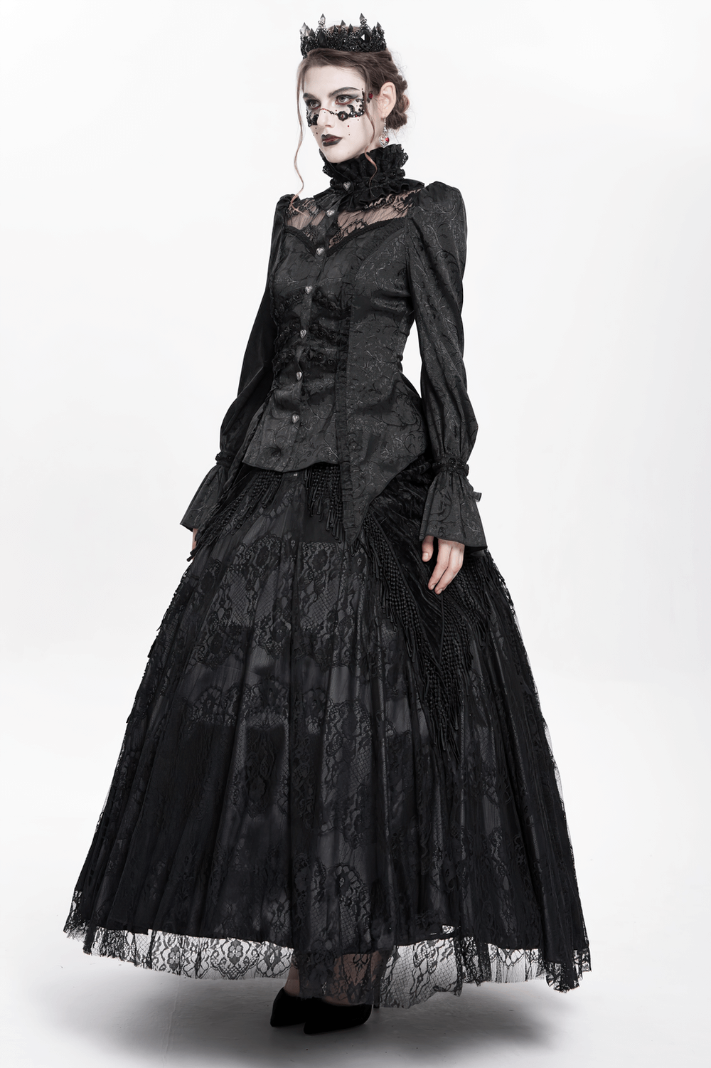 Victorian-inspired gothic outfit featuring lace details, high collar, and dramatic black skirt.