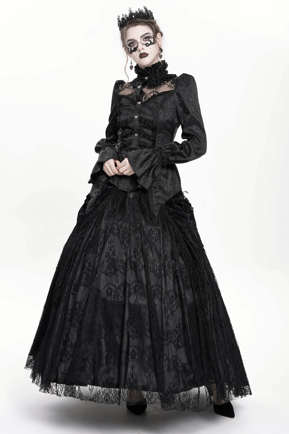 Gothic lace high neck blouse with heart buttons, worn with a flowing black skirt, creating a Victorian-inspired gothic look.