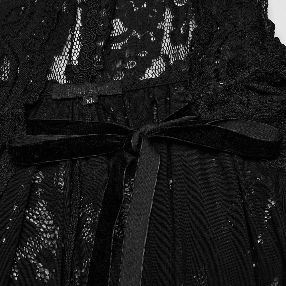 Close-up of Gothic lace hooded cape showcasing rose trim and velvet ties, perfect for dark fashion enthusiasts.