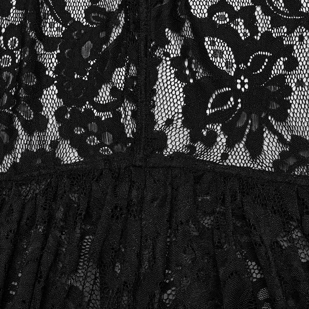 Close-up of intricate black lace fabric showcasing floral patterns, perfect for gothic fashion.