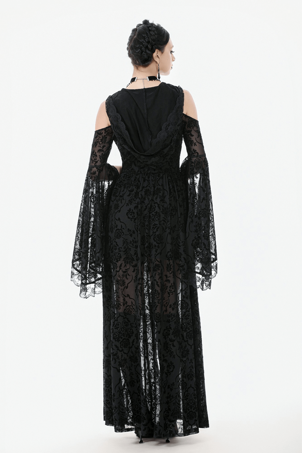 Gothic Lace Hooded Cold Shoulder Maxi Dress With Zip Closure displayed from behind, showcasing sheer floral lace and flowing bell sleeves.