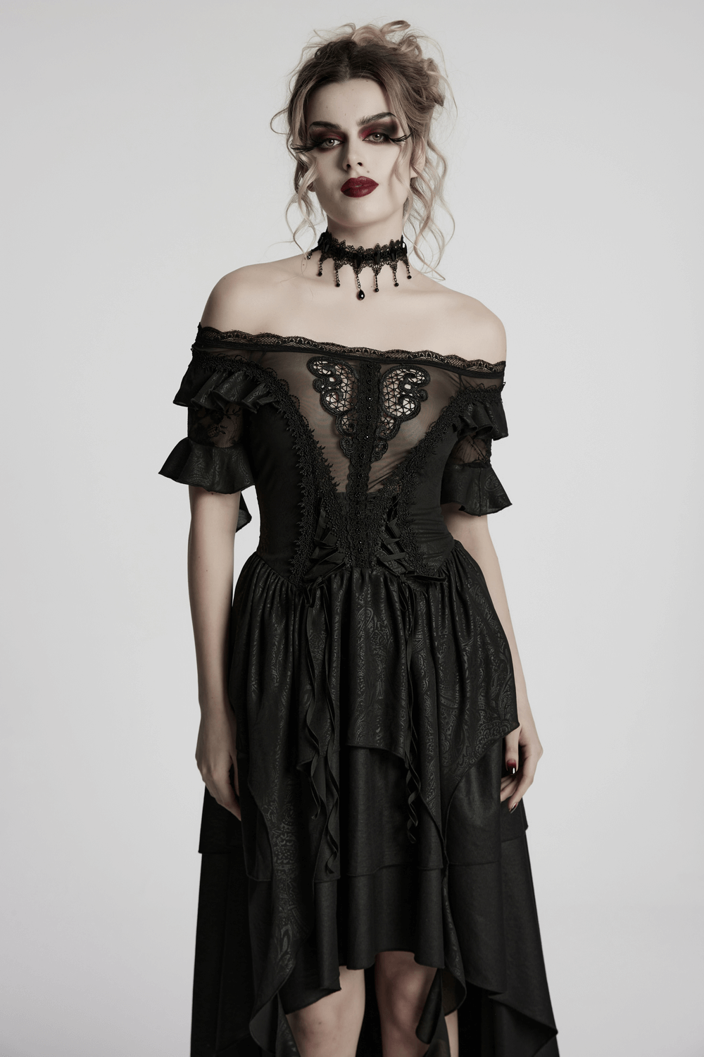 Gothic lace layered off-shoulder maxi dress with ruffled sleeves and dramatic high-low cut.