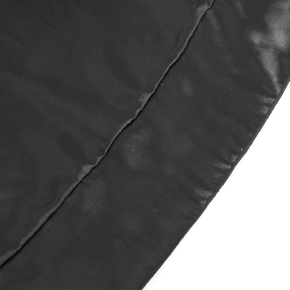 Close-up of the smooth black satin fabric of a Gothic lace layered skirt, highlighting its elegant texture.