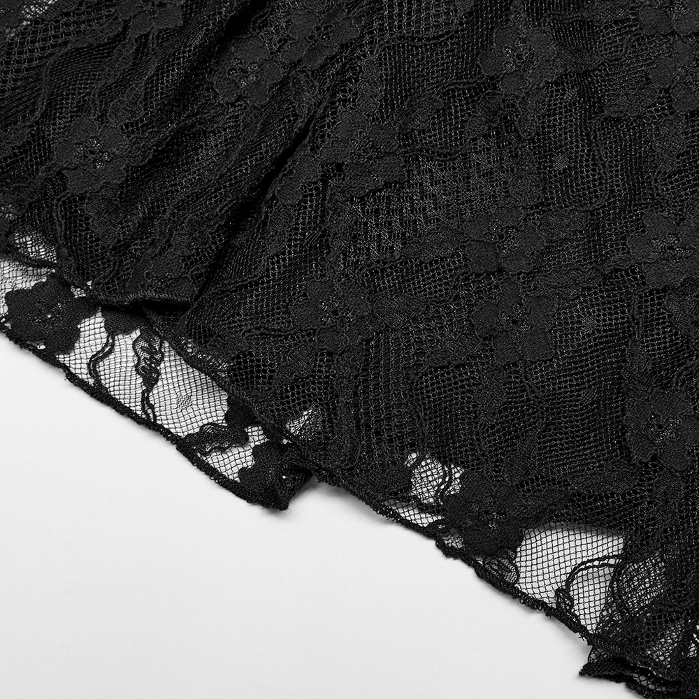 Close-up of elegant black lace fabric with floral patterns, perfect for gothic punk attire.