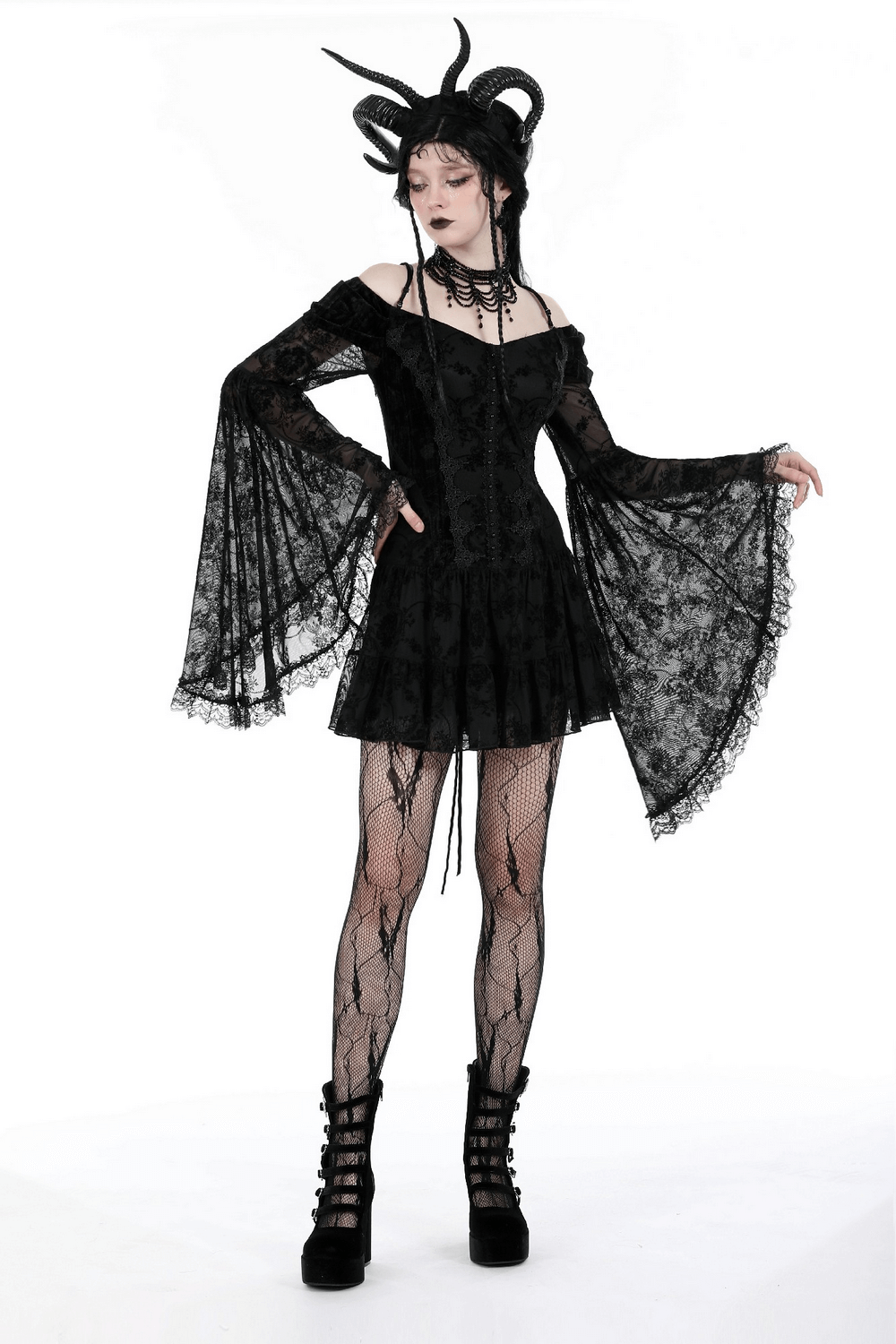 Gothic lace off-shoulder mini dress with bell sleeves, paired with edgy accessories and net tights.
