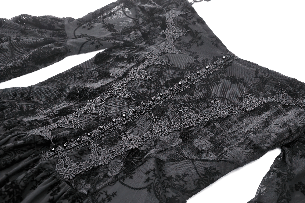 Elegant black lace gothic mini dress with intricate patterns and button detailing.