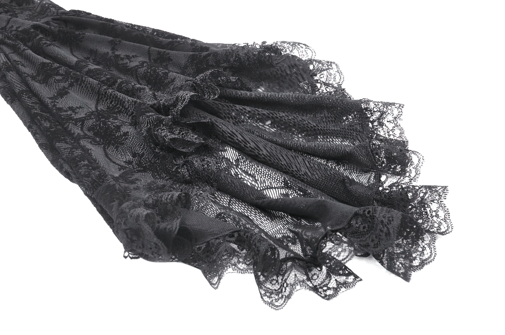 Elegant black lace fabric with intricate patterns and ruffled edges, perfect for gothic fashion.