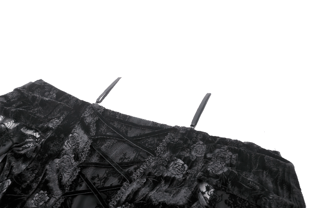 Close-up of the gothic lace off-shoulder dress, showcasing intricate black lace patterns and elegant straps.