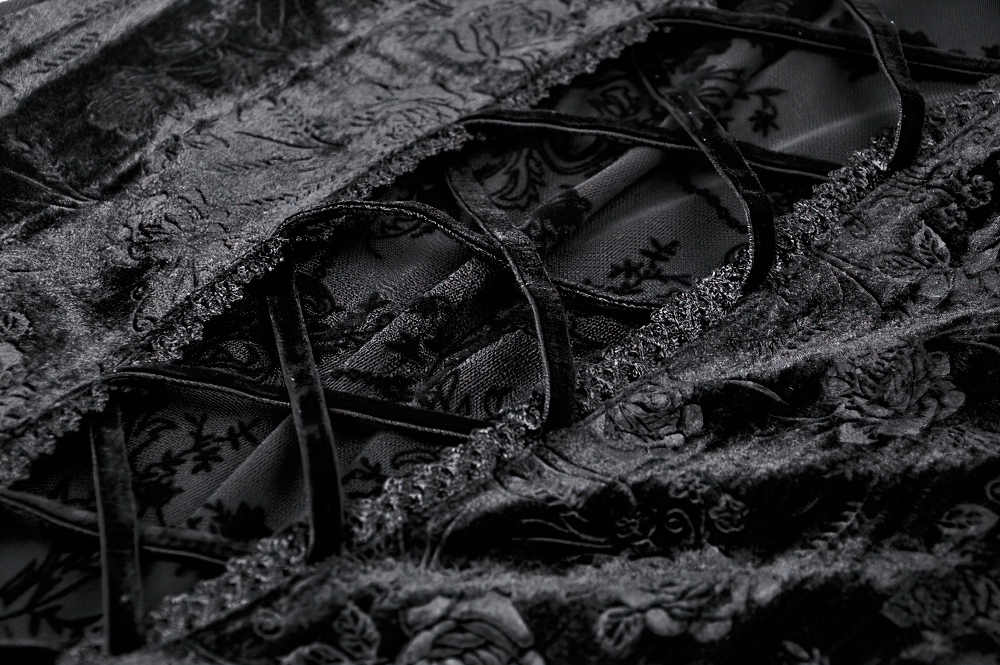 Elegant black lace fabric with intricate patterns and textures, perfect for gothic fashion.