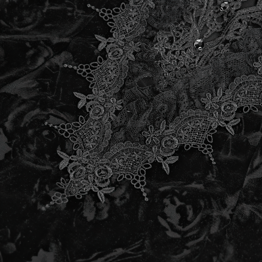 Close-up of intricate black lace detailing with floral patterns, perfect for gothic fashion.