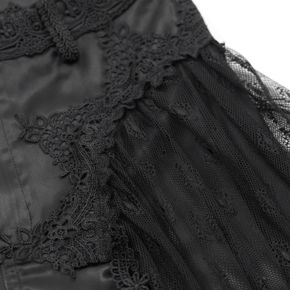 Close-up of gothic lace and satin detailing on dramatic flared pants, showcasing intricate patterns and dark elegance.