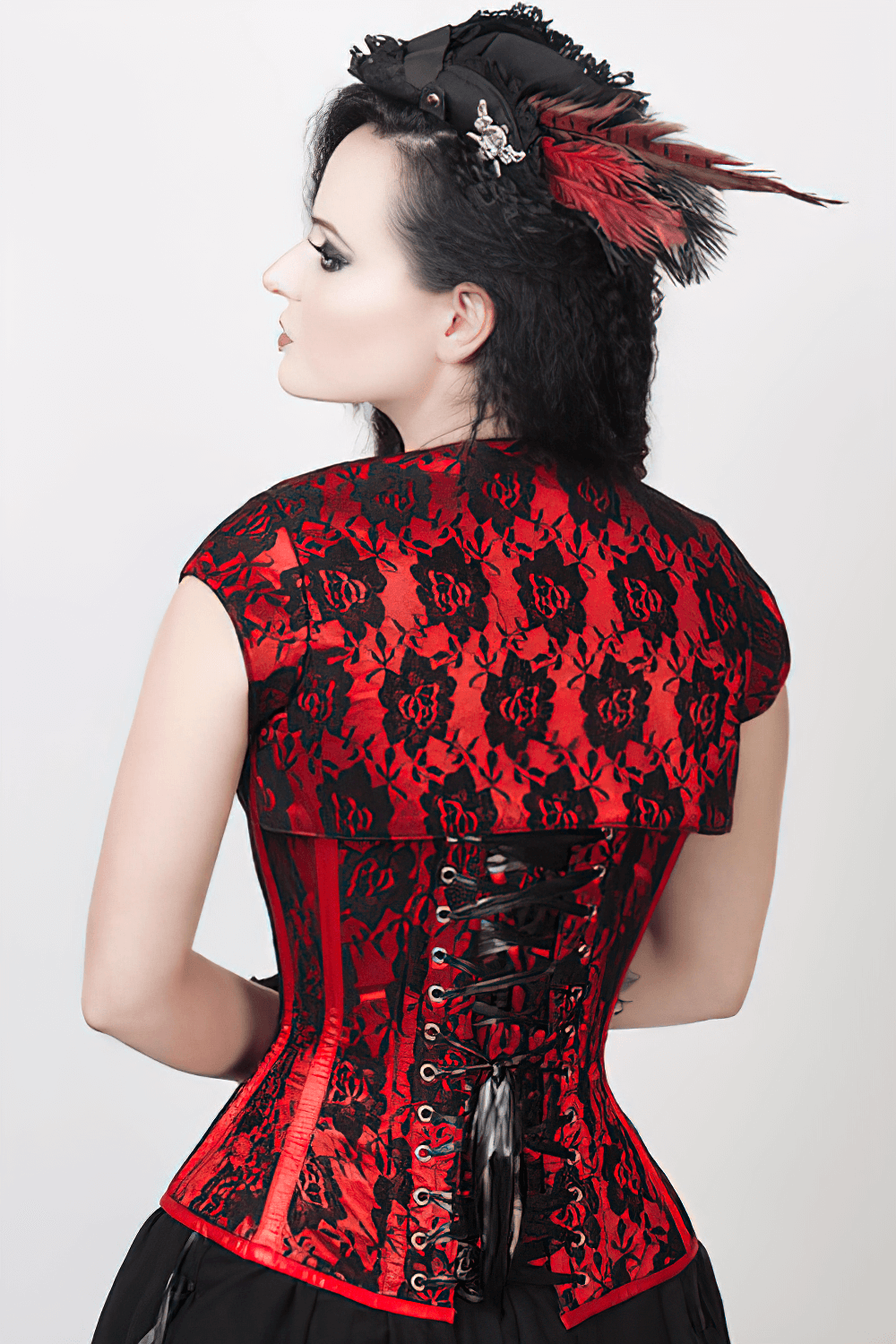 Gothic lace overlay corset with bolero in red and black, featuring back lacing and elegant design.