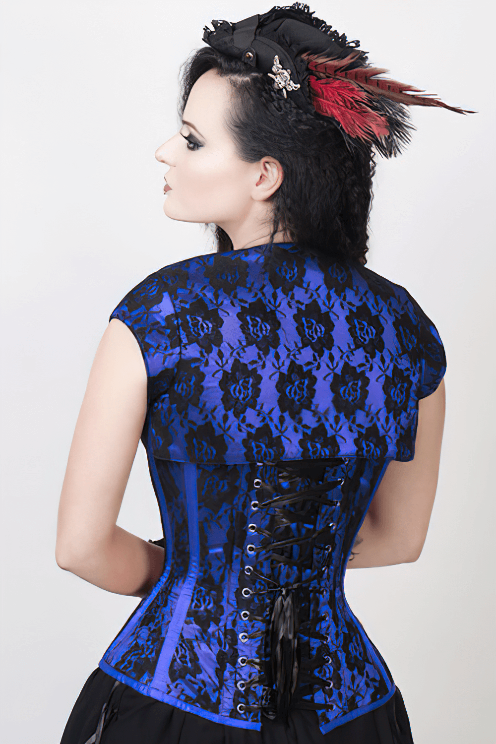 Gothic blue lace overlay corset with bolero and back lacing, perfect for Victorian and steampunk styles.