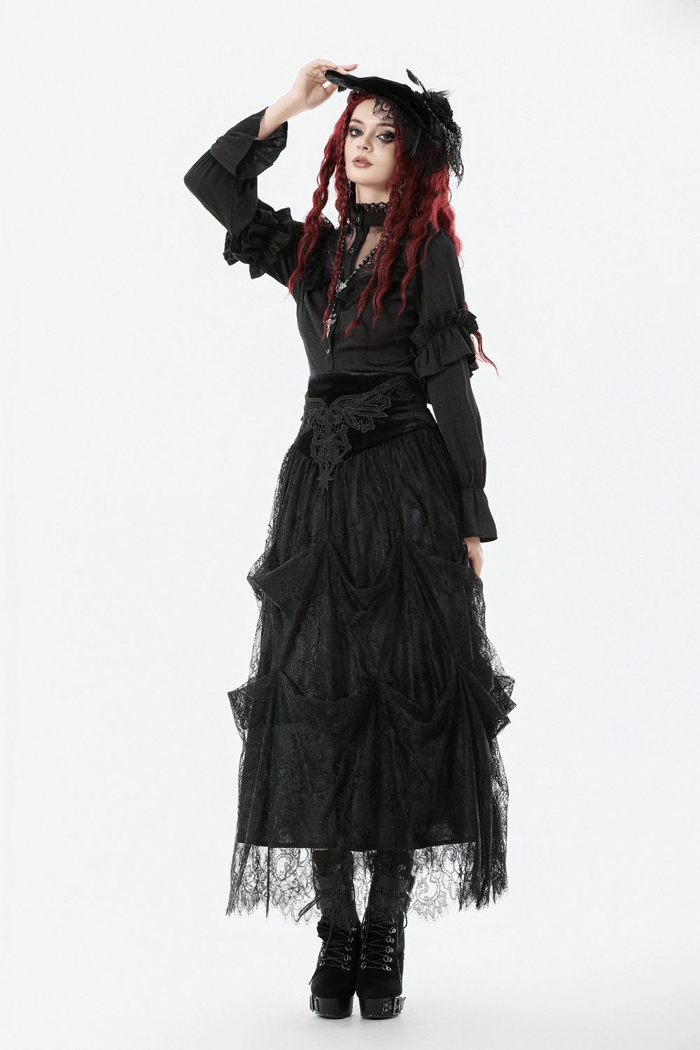 Gothic Lace Ruffle Black Blouse with Button Closure worn with a dramatic black lace skirt and stylish accessories.