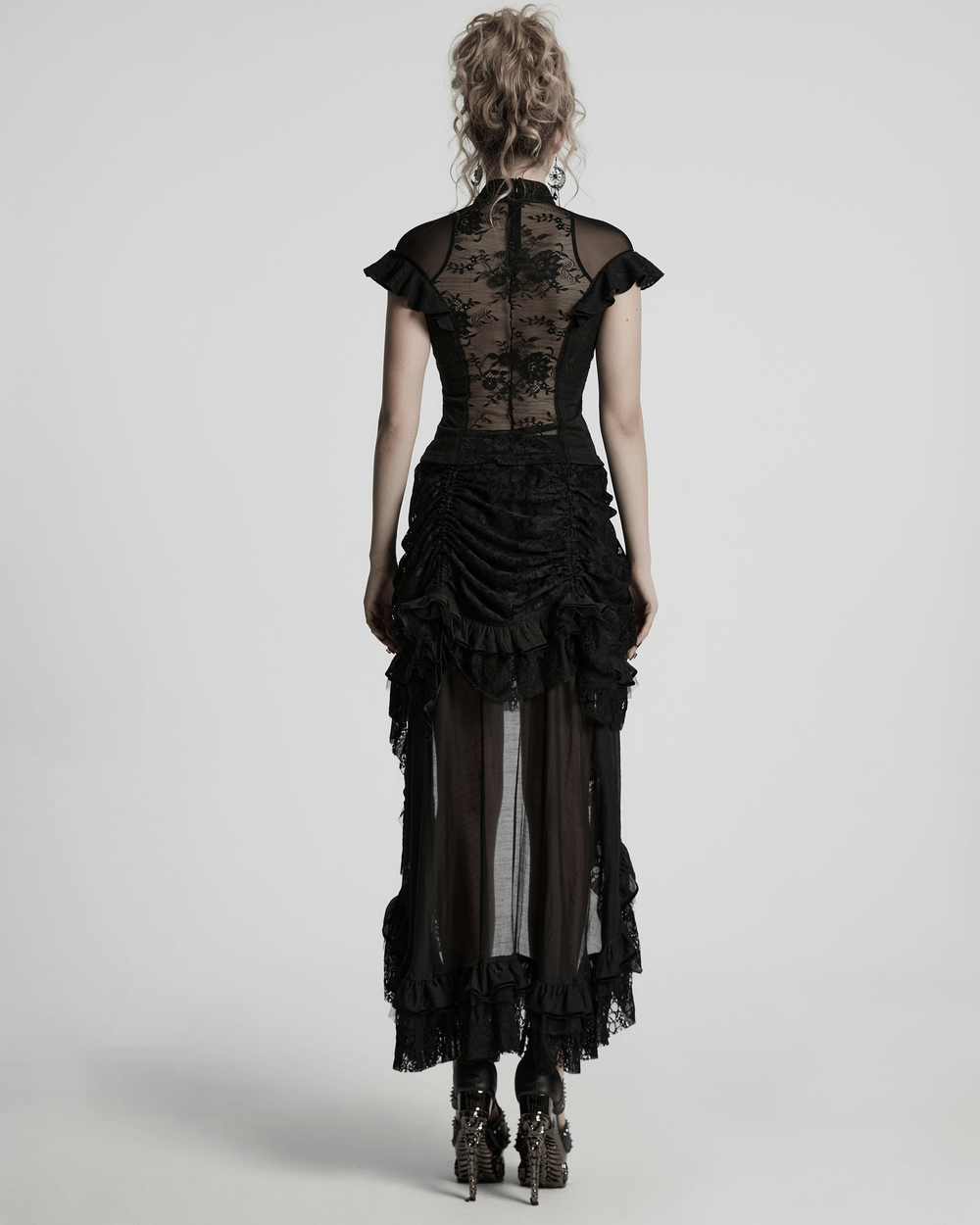 Back view of a gothic lace ruffled high-low skirt with chiffon mesh layers, showcasing elegant detailing and dramatic flair.